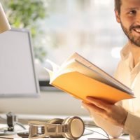 man smiling at the work